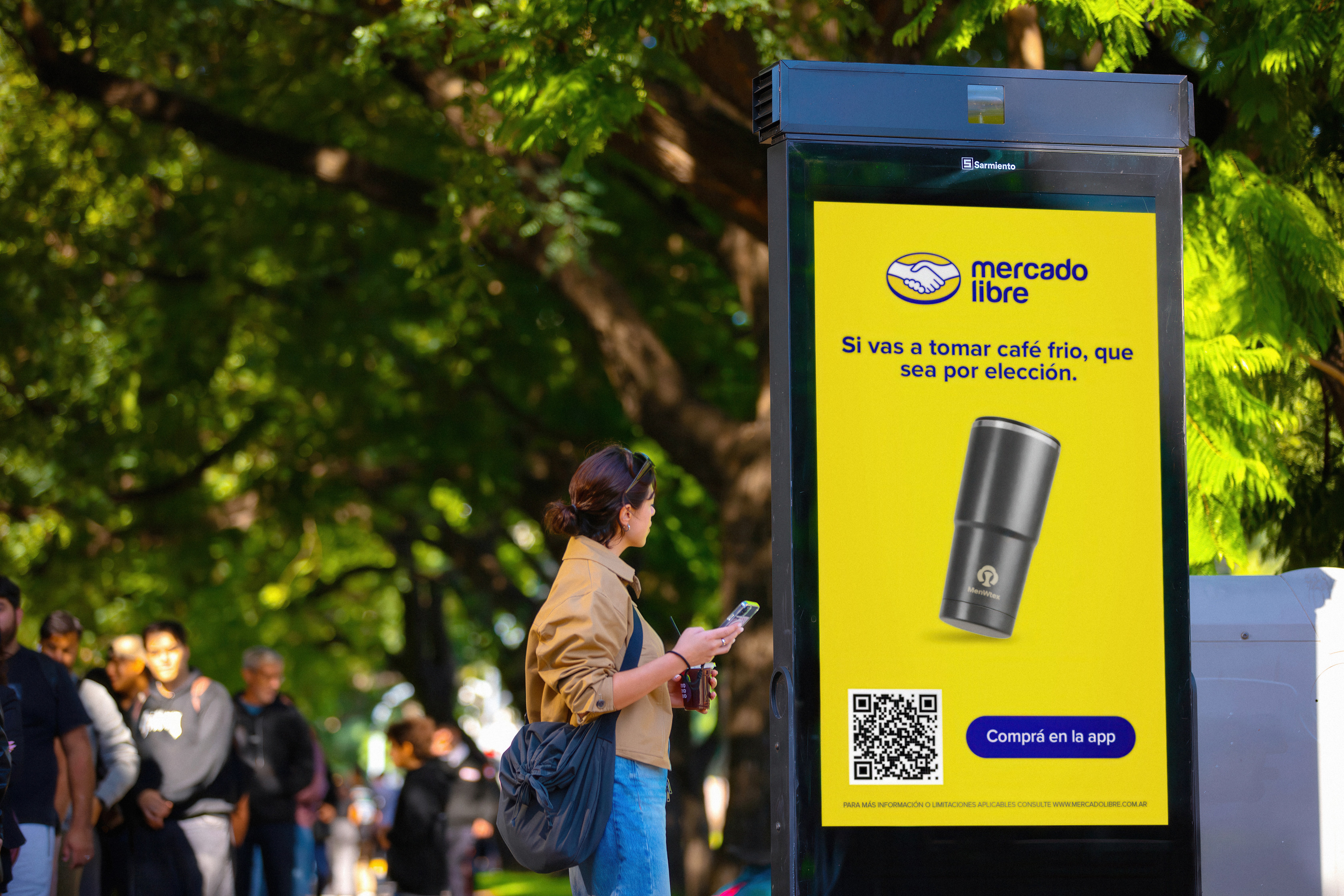 Mercado Libre billboard with QR code and personalized message
